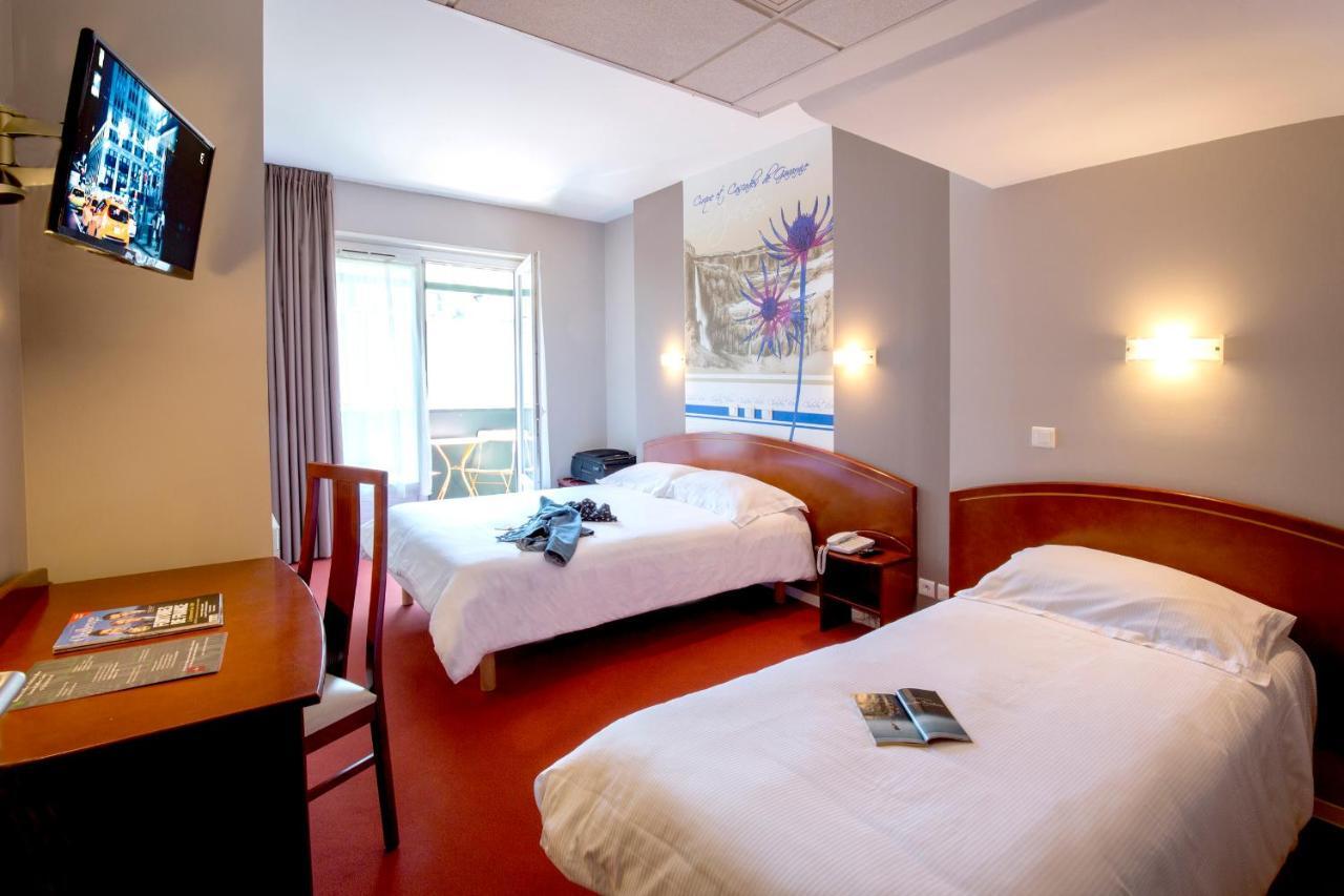 Cit'Hotel De La Marne Tarbes Bagian luar foto