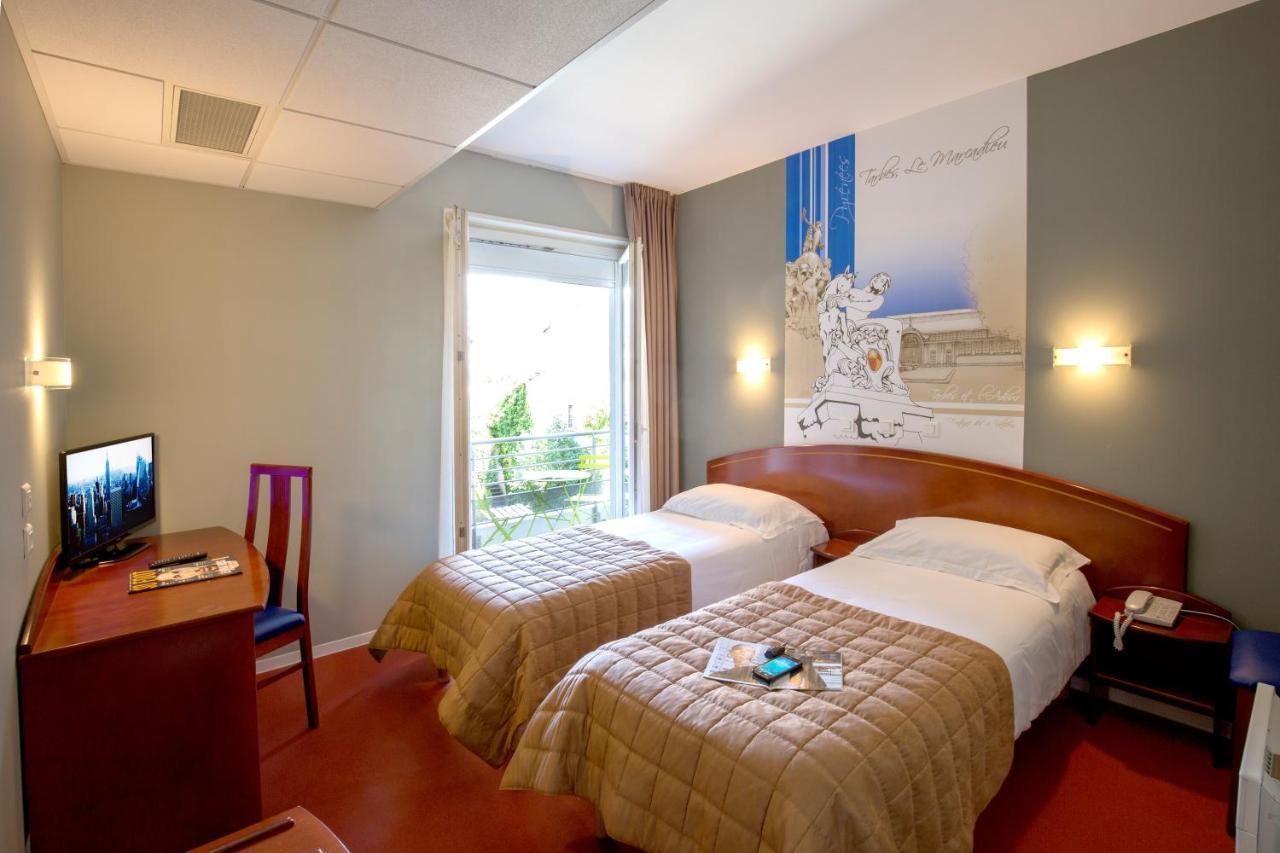 Cit'Hotel De La Marne Tarbes Bagian luar foto